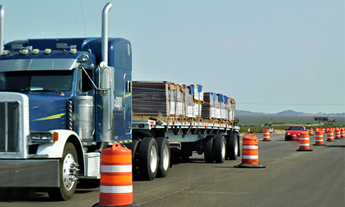 Flatbed truck shipping freight at a fair rate